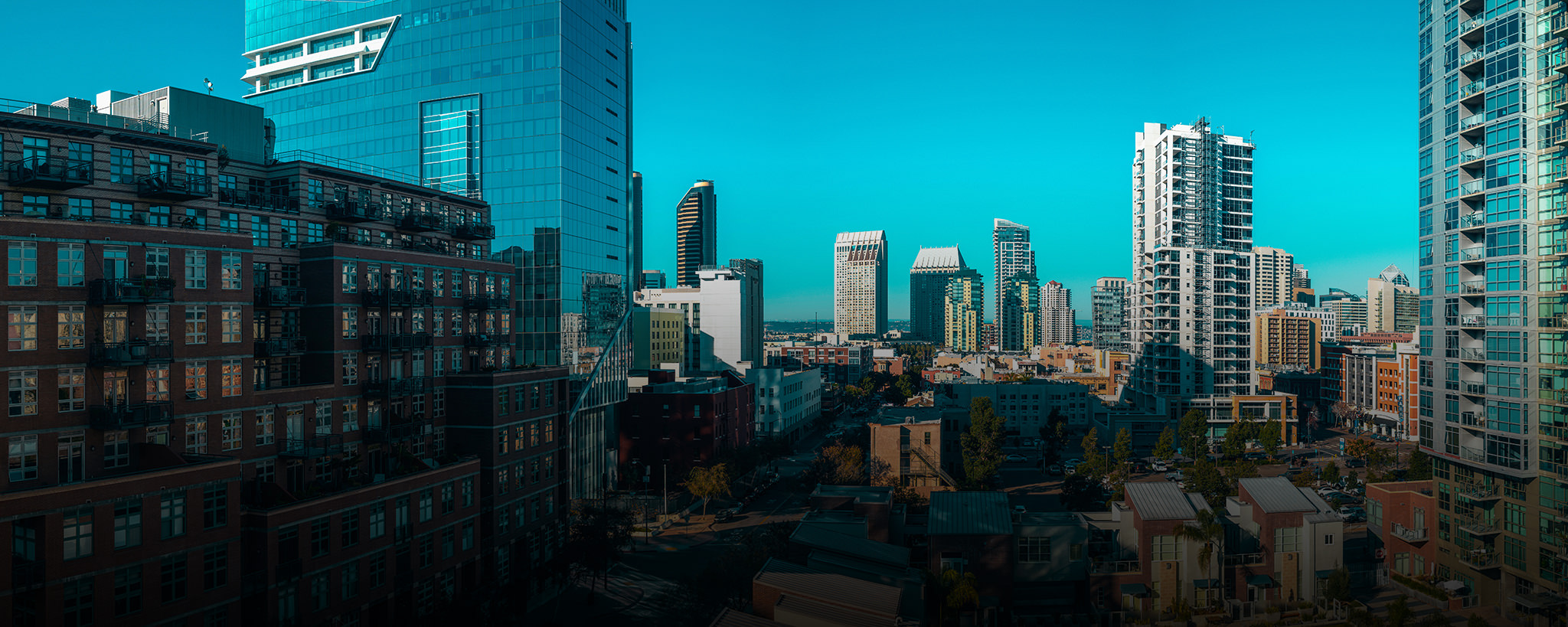 Photo of palm trees at sunset by Adam Birkett - unsplash.com/photos/75EFpyXu3Wg
